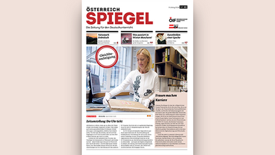 Eine Frau arbeitet an einem Tisch mit Dokumenten in einer Bibliothek. Thema: Gleichstellung der Geschlechter.